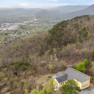 Where peaceful views meet coveted convenience. Mowbray Mountain home with bright main living spaces, expansive deck, and unfinished basement.

🚗 10 Minutes to Hixson dining and shopping
🚗 25 Minutes to Downtown Chattanooga
📍 9028 Terrace Falls Dr, Soddy Daisy, TN

Learn more at ToddHenon.com

Seller Represented by Todd Henon and Brittany Fulmer Ennen

@bfulmer85